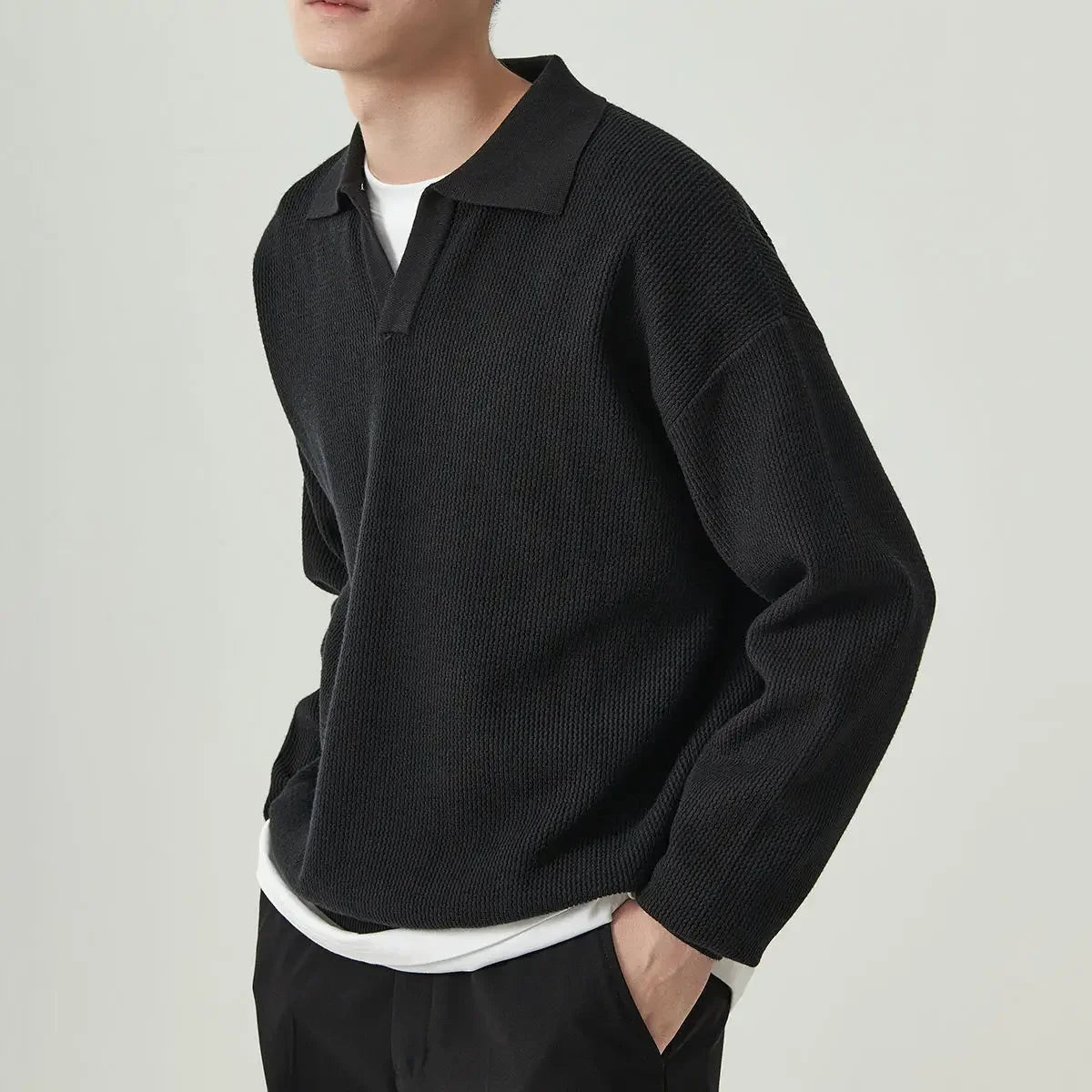 Magnus | Suéter de polo de tricot acanalado.